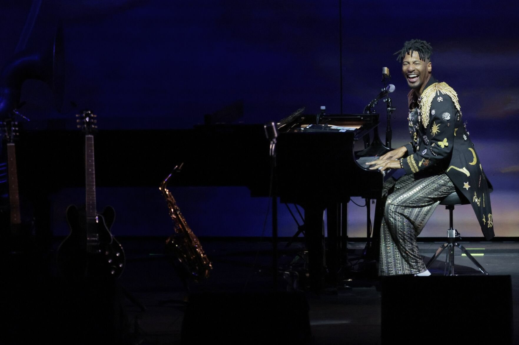 Jon Batiste performs at the Muny